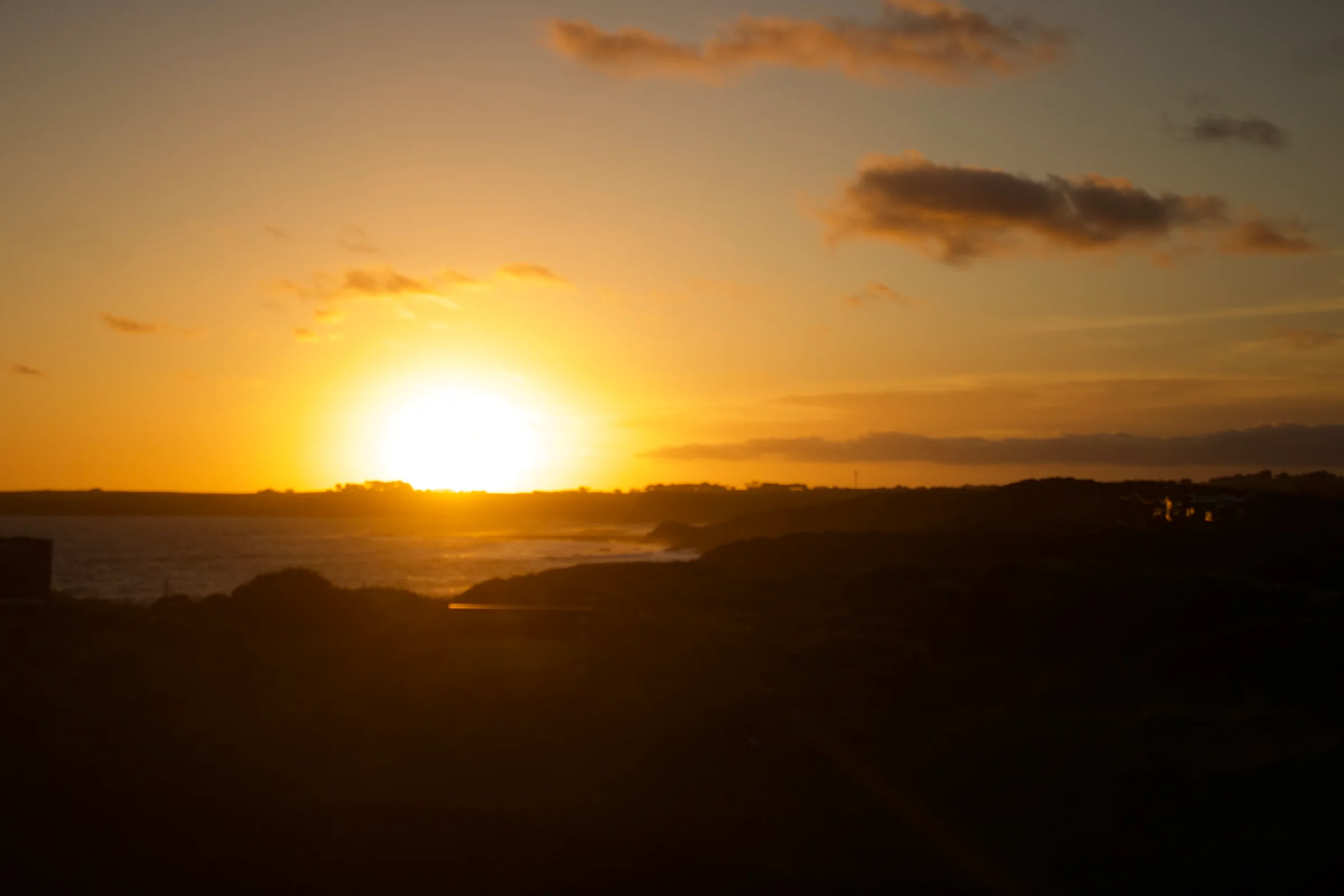 A sunset over the ocean, on the cliffs of Phillip Island.