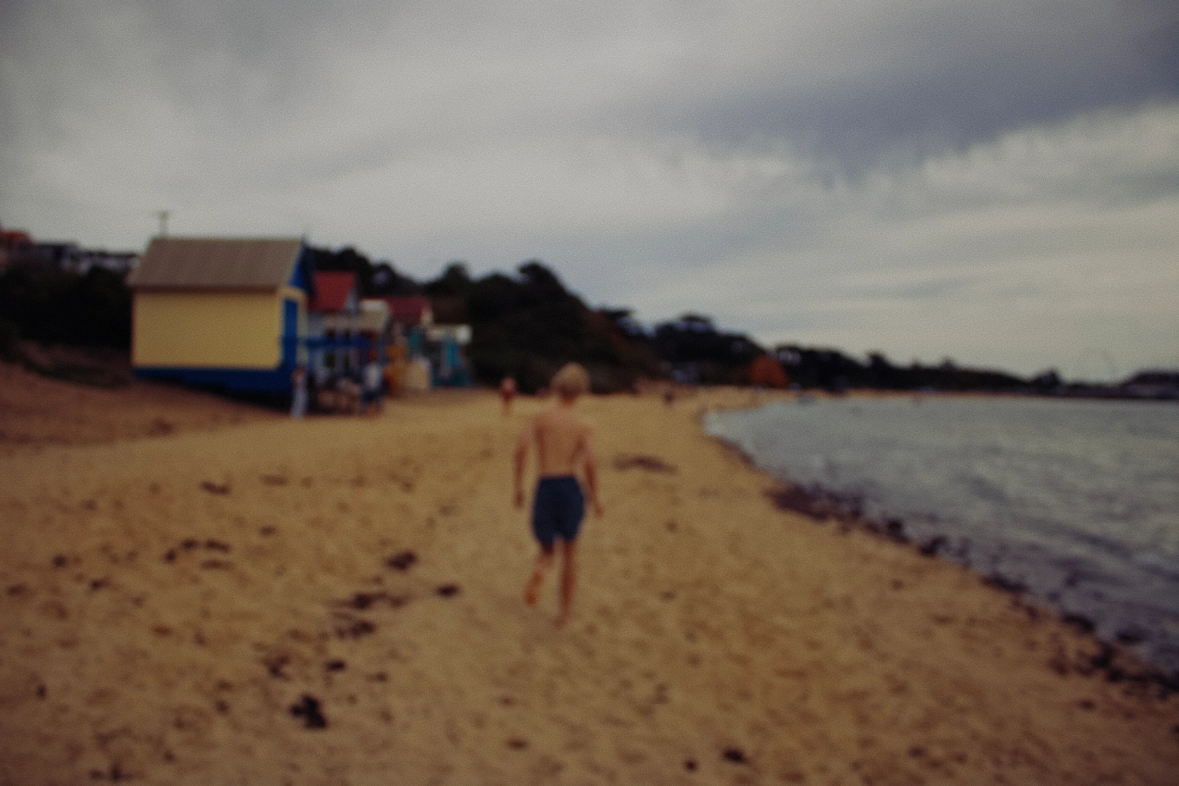 My Cousin walking across the beach, at the Mornington Peninsula. 
