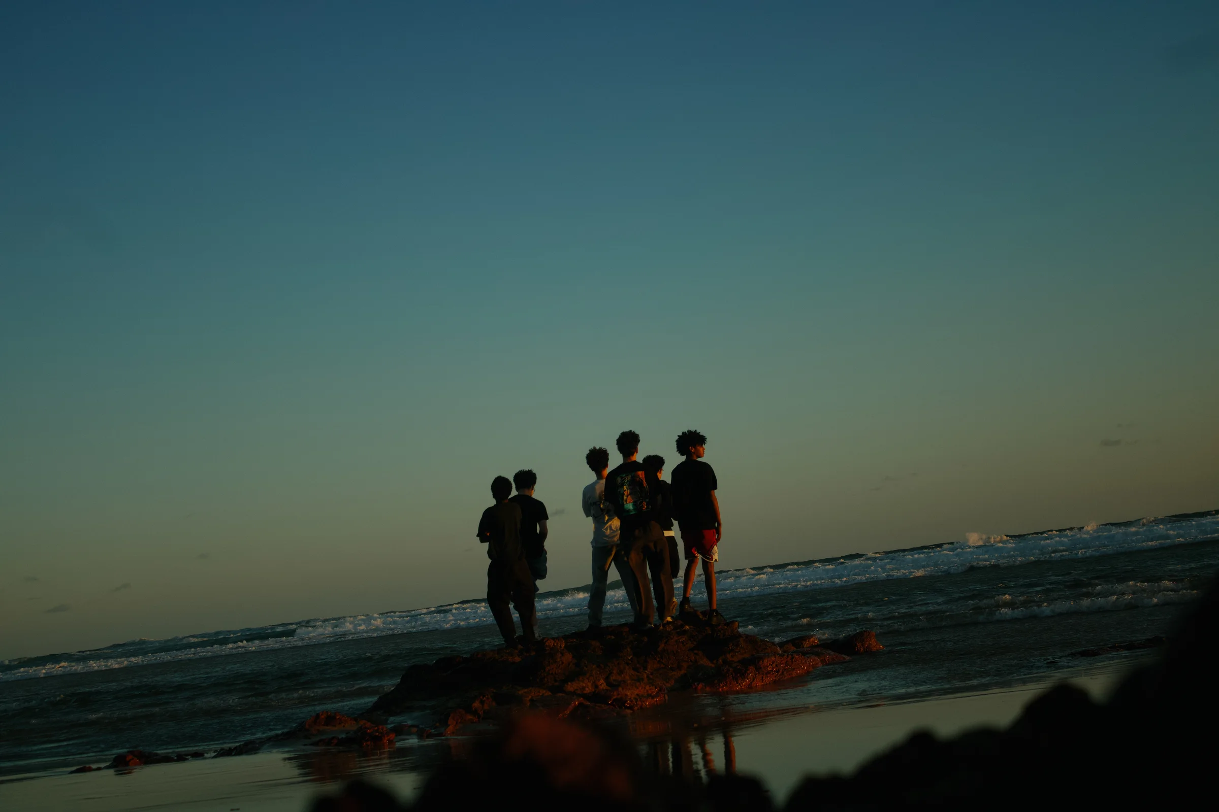 Group shot of me and my mates staring out across the ocean.